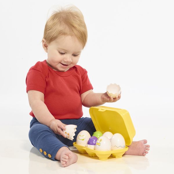 Іграшка розвиваюча Tomy Toomies Курчата в шкаралупі, яйця в лотку, сортер Монтессорі E1581 фото