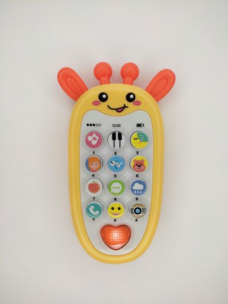 Іграшка телефон - прорізувач для малюків TK Group Жирафа з музикою та підсвічуванням 24063 фото