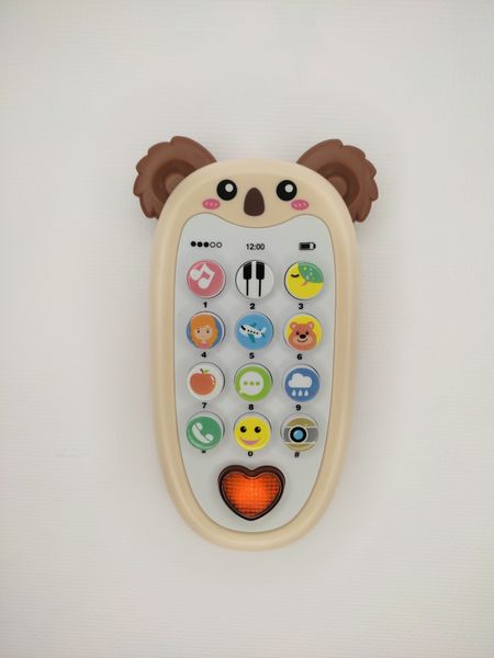 Іграшка телефон - прорізувач для малюків TK Group Коала з музикою та підсвічуванням 24063 фото