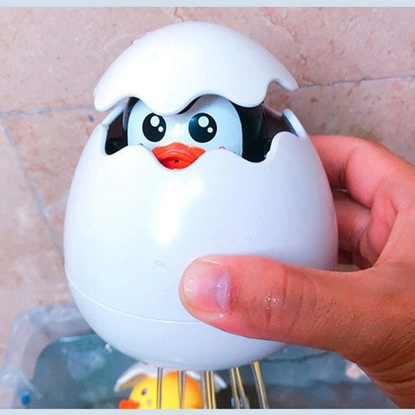 Іграшка для купання Metoo Пінгвін в яйці, лійка з бризгалкою 10см Білий (MT-EGG01) MT-EGG01 фото