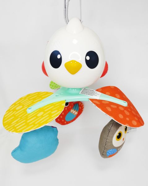 Музичний мобіль Hola Toys карусель на коляску Пташка E995 фото