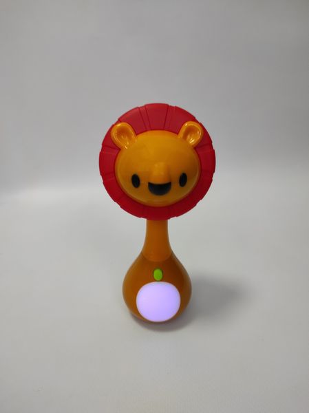 Погремушка музыкальная Hola Toys "Лев" с грызунком и подсветкой 3134C фото